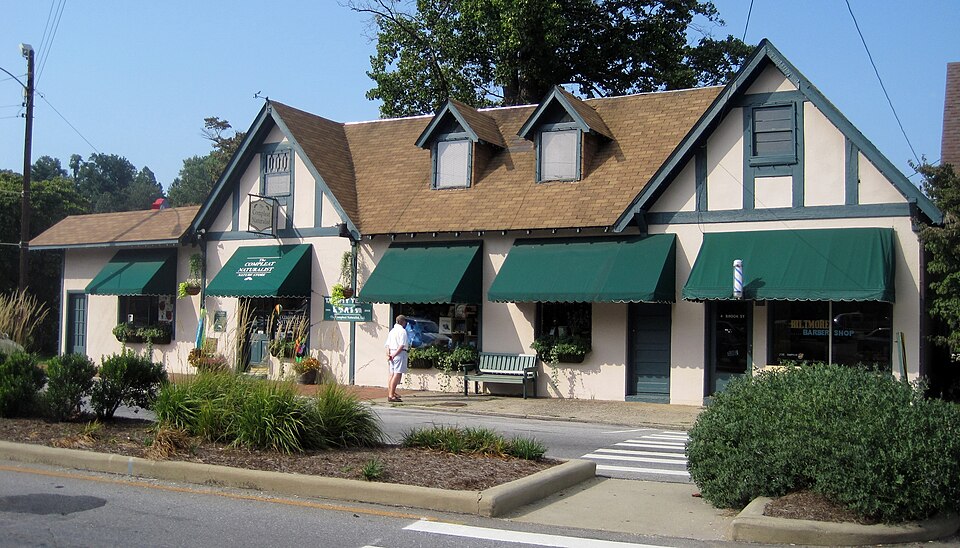 Historic commercial buildings lining a street in Biltmore Village, Asheville