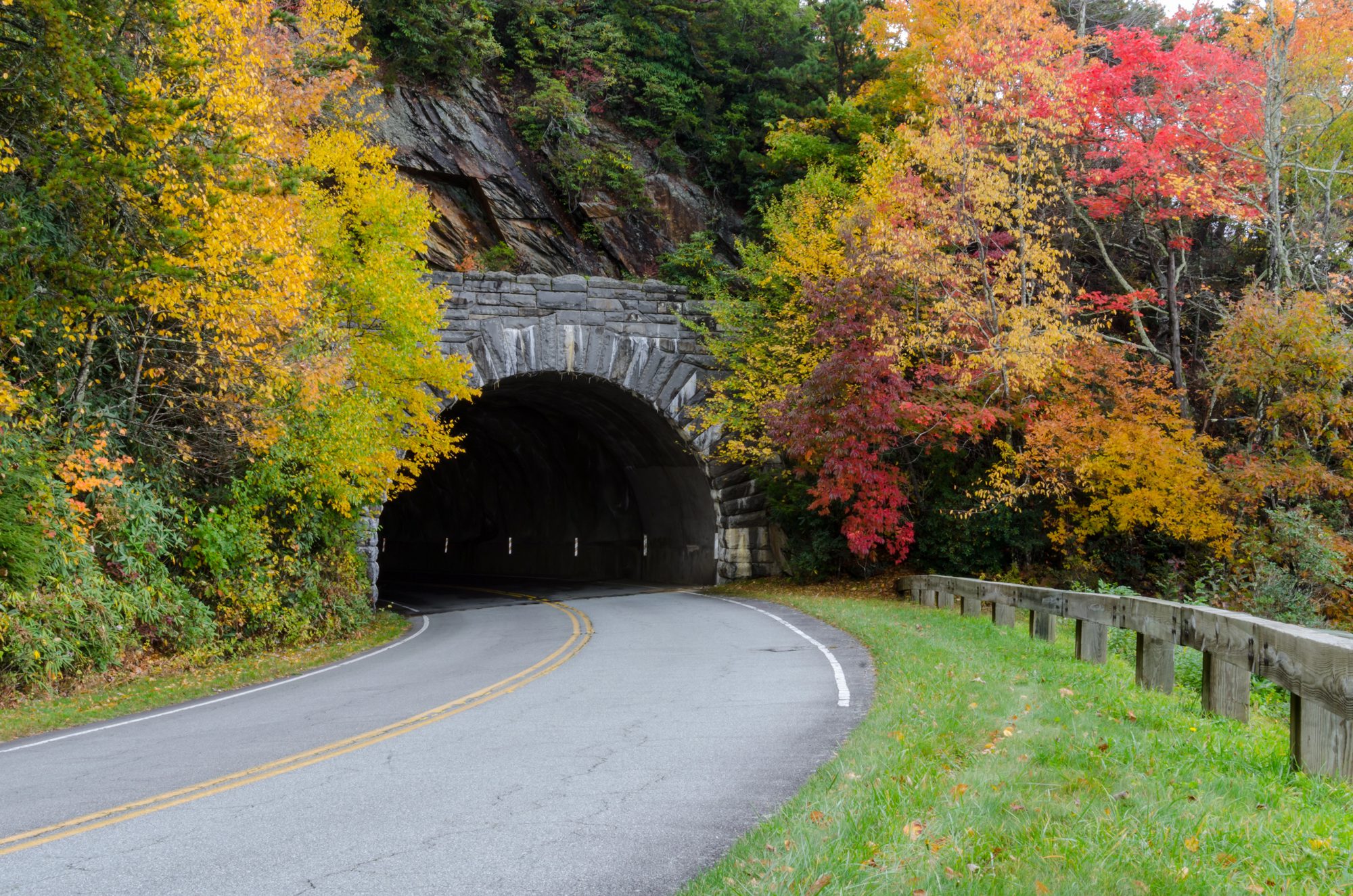 A stone-faced tunnel portal, one of nine along this stretch.