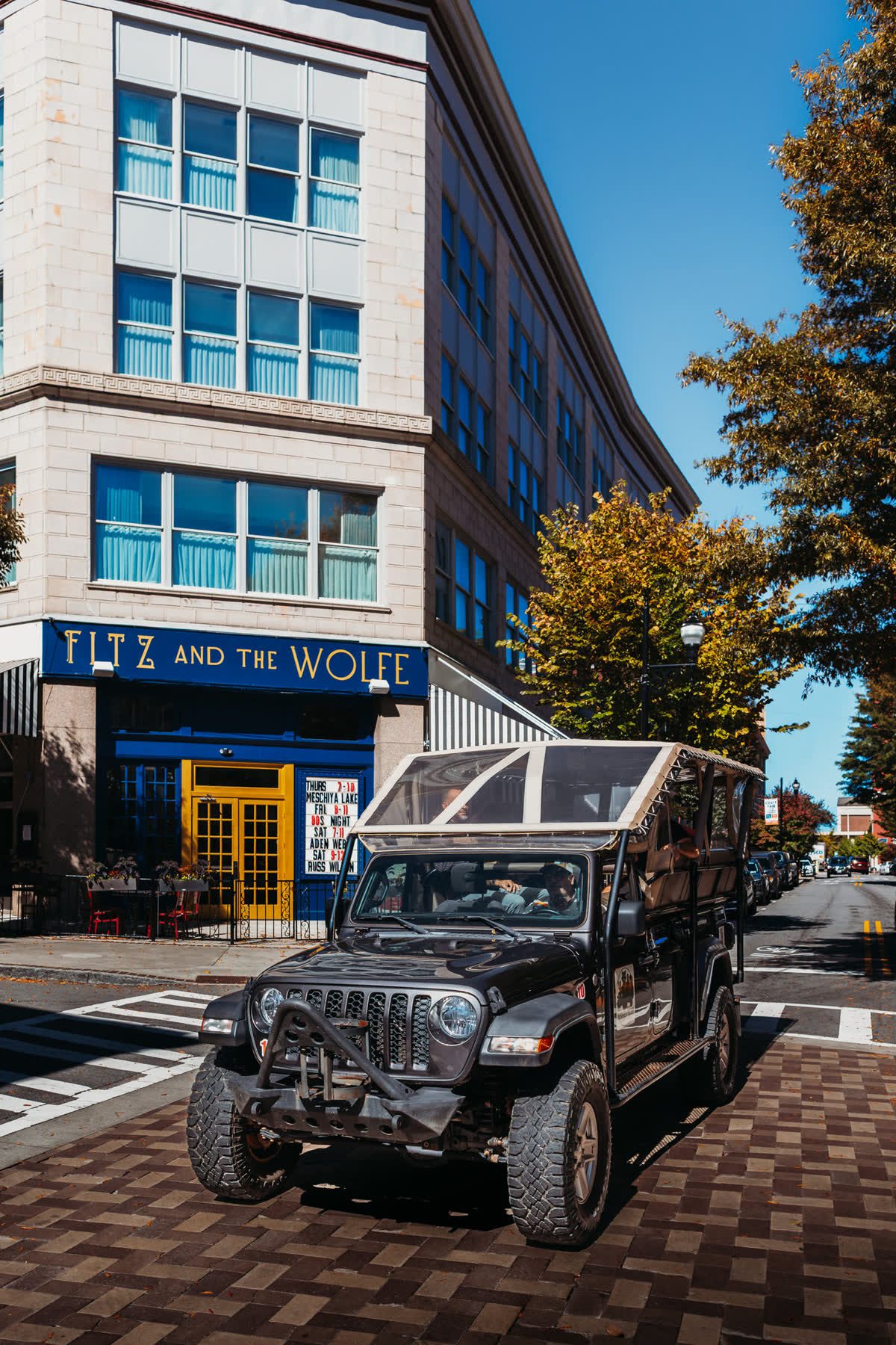 Parked downtown outside a bar that named itself after both of the writers on this tour.