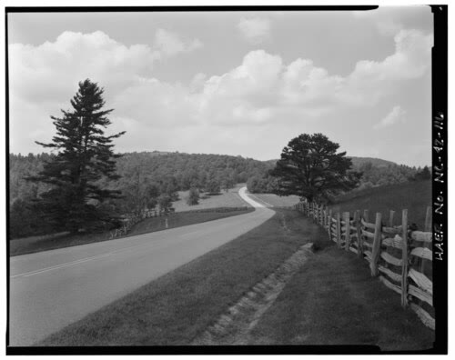 Doughton Park, NC. Wide open grassy balds on a high ridge with a footpath cutting through and cloud shadows moving across.