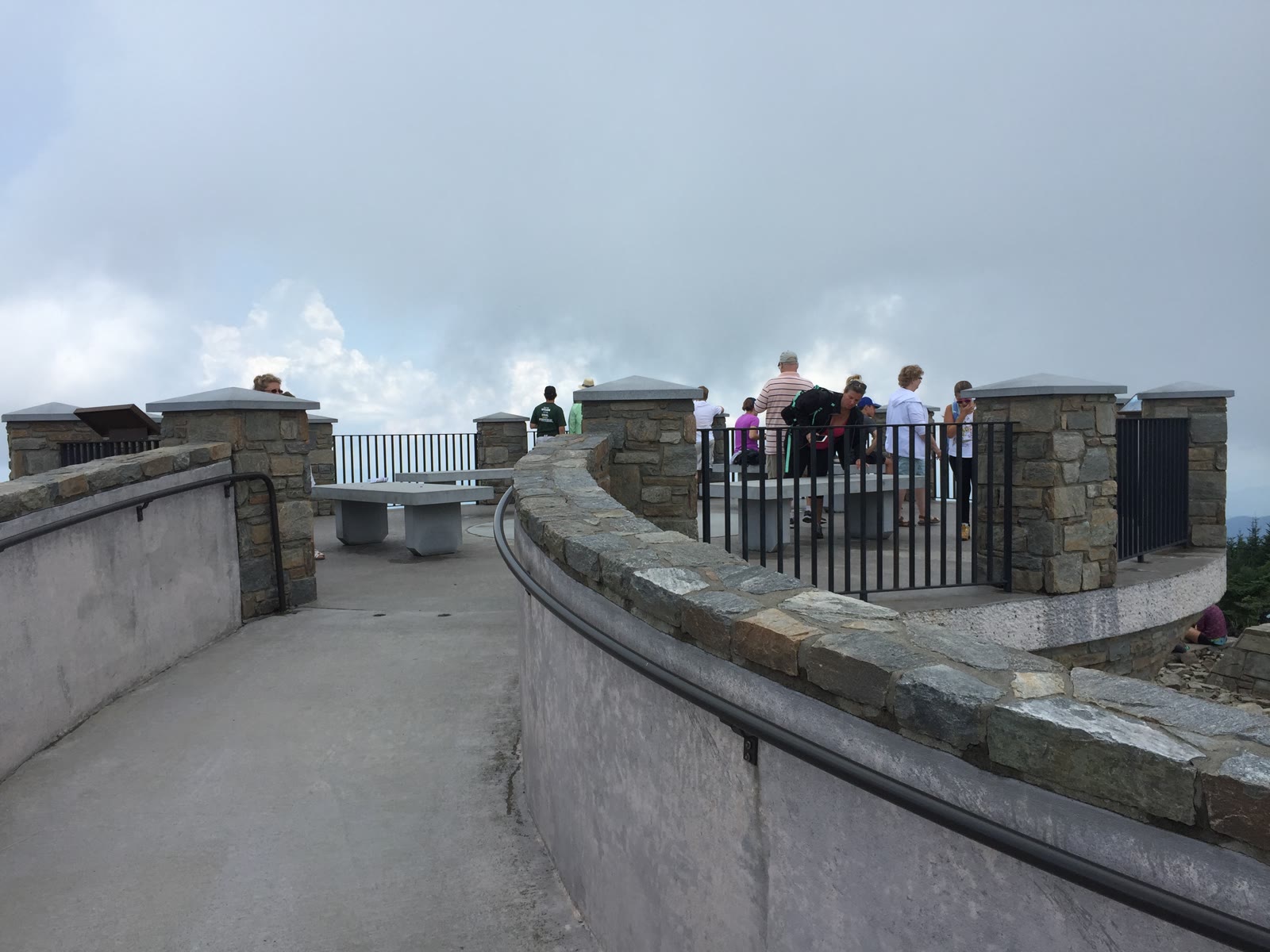 Mount Mitchell State Park, NC. The circular concrete-and-stone summit observation deck with its spiral ramp, standing above dark spruce-fir.